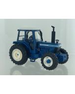 Ciągnik Ford 9700 4WD niebieski 1:32 Britains – limitowany model kolekcjonerski